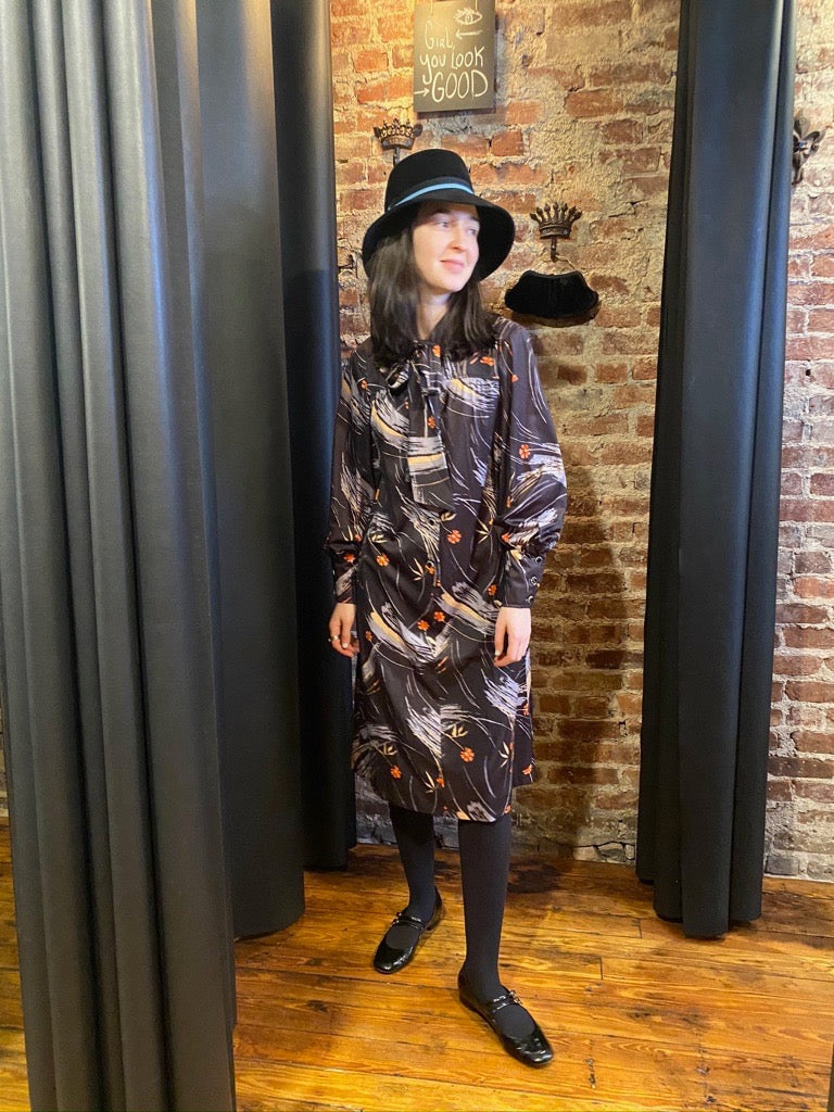 Black abstract dress with bow
