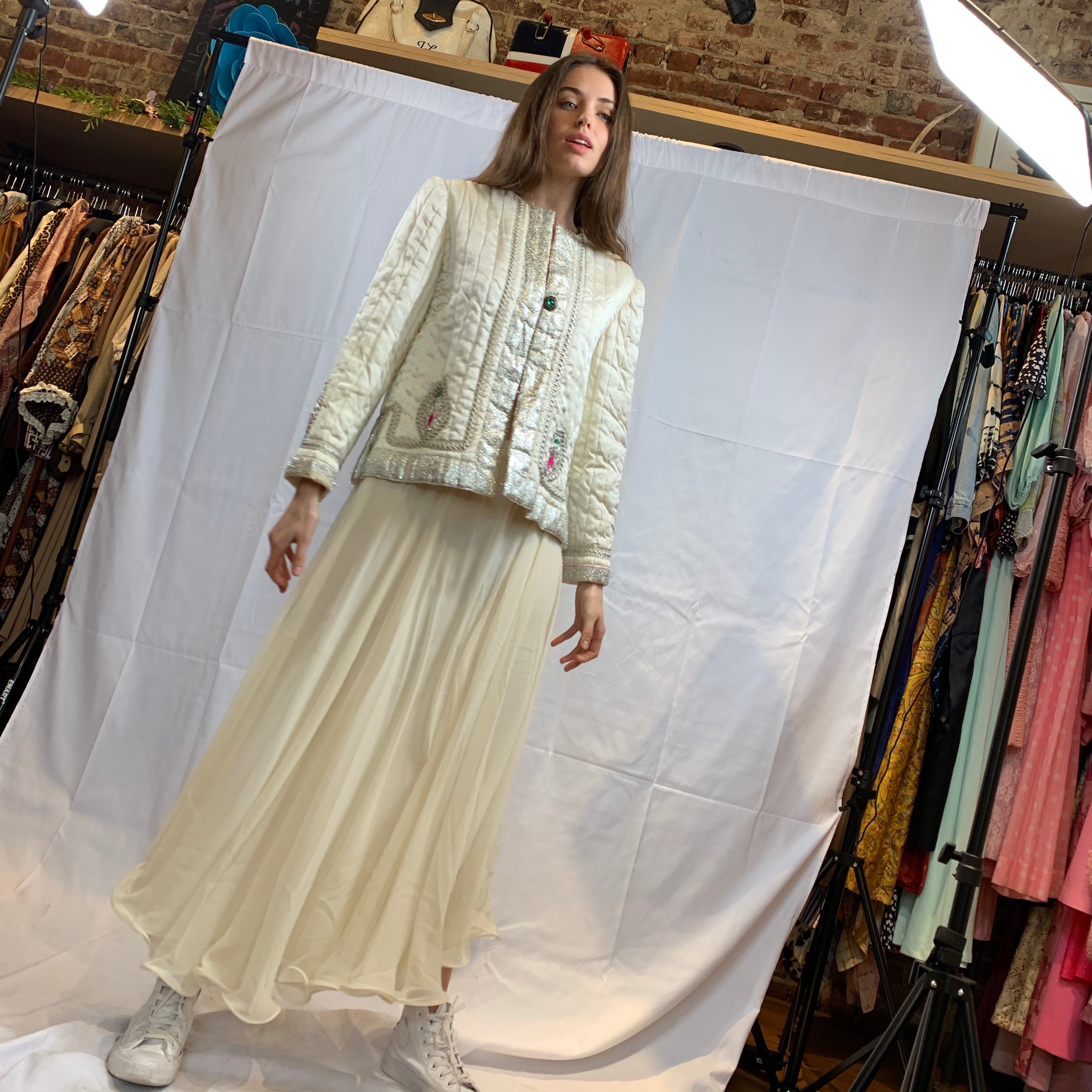 White quilted jacket with silver embroidery
