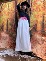 Black and white evening maxi with pretty pink belt