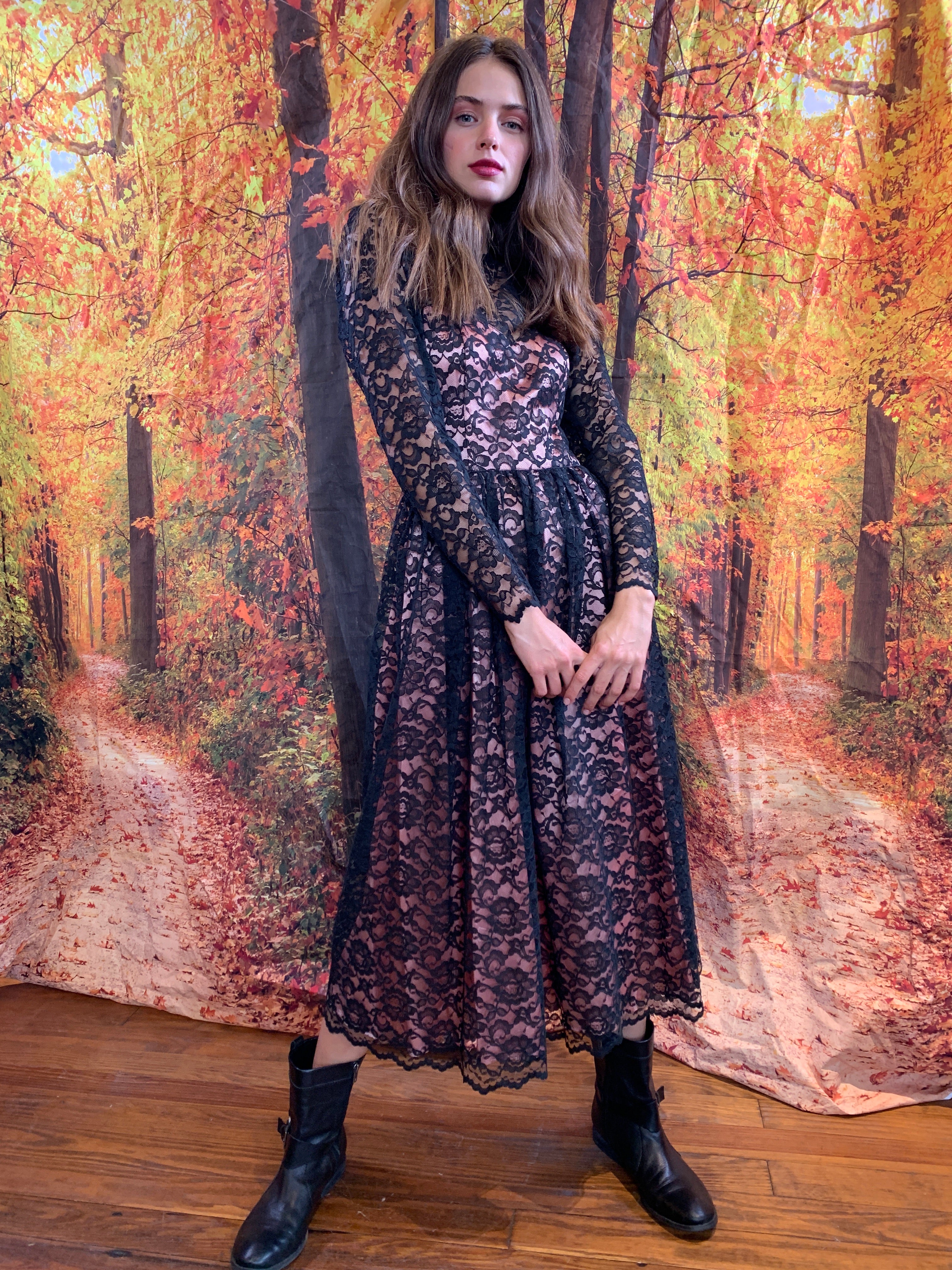 Black lace dress with pink under pinning