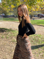 Knit maxi with pom poms